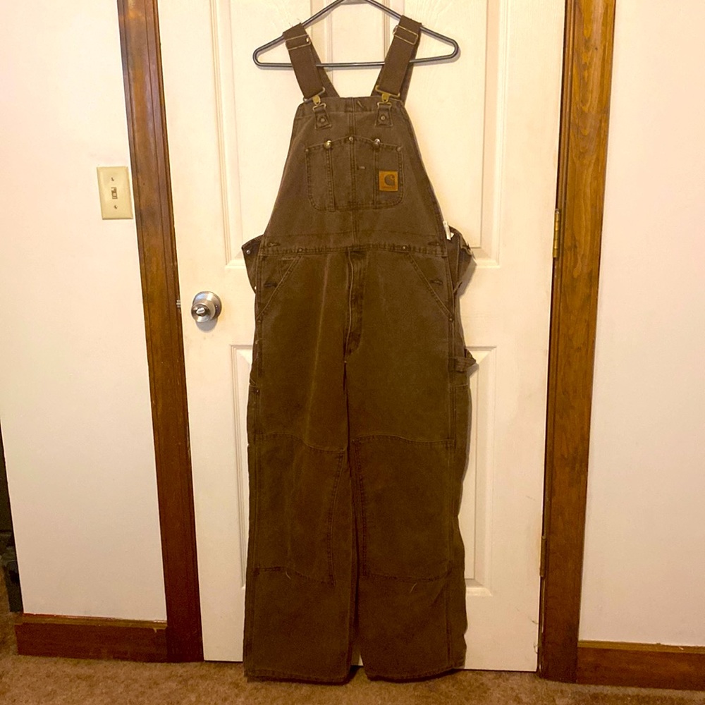 Carhartt bib coveralls. Dark brown in color.